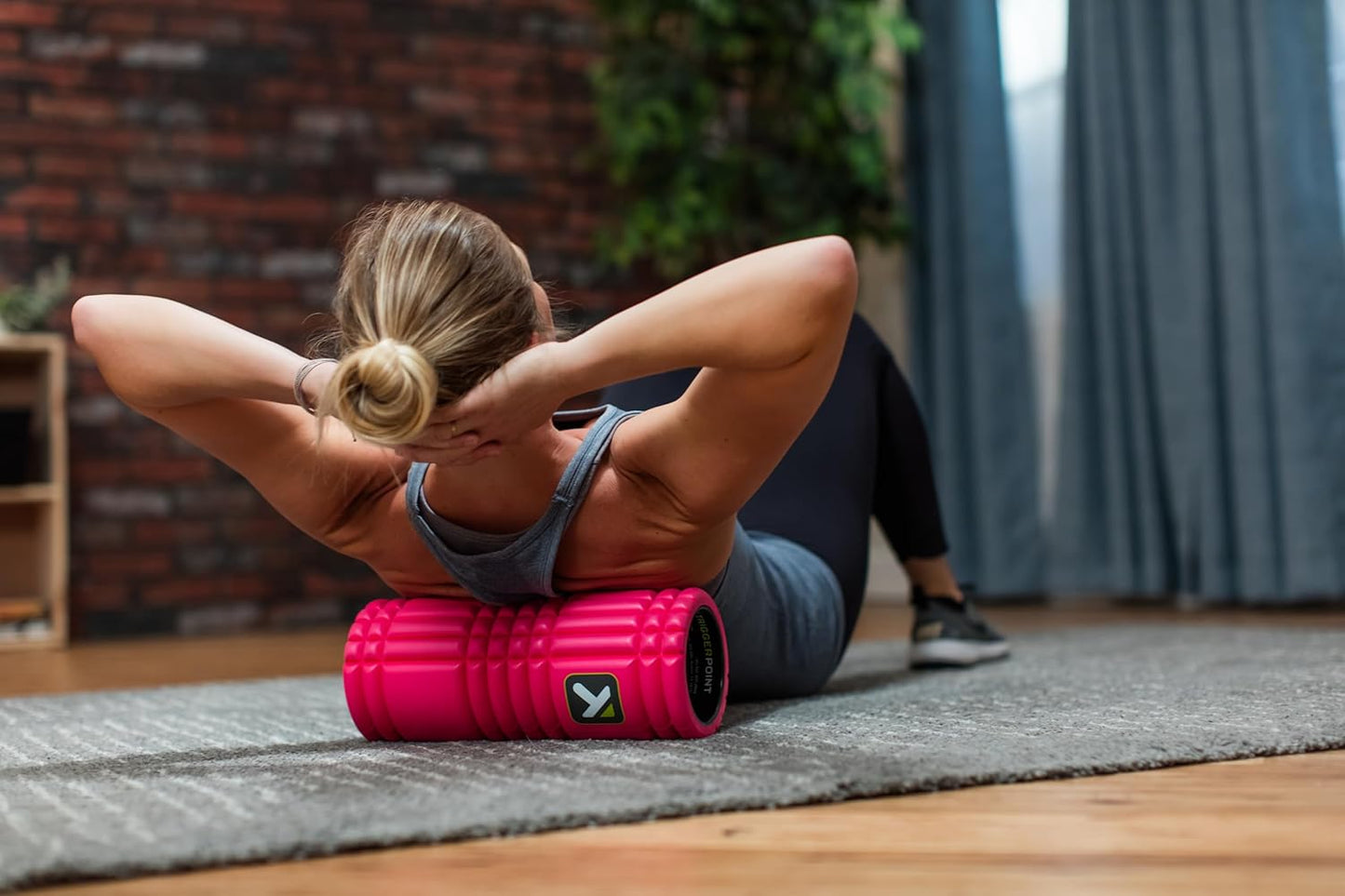 TriggerPoint Grid Foam Roller - Multiple Density Exterior, Rigid Core - Appreciated by Therapists and Athletes - Standard Density, Includes Online Instruction Video, 13"
