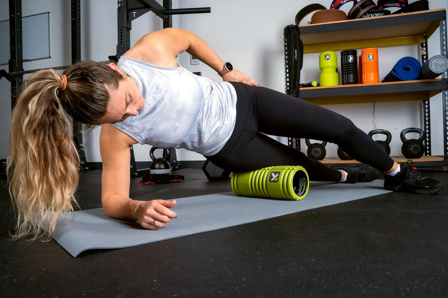 TriggerPoint Grid Foam Roller - Multiple Density Exterior, Rigid Core - Appreciated by Therapists and Athletes - Standard Density, Includes Online Instruction Video, 13"