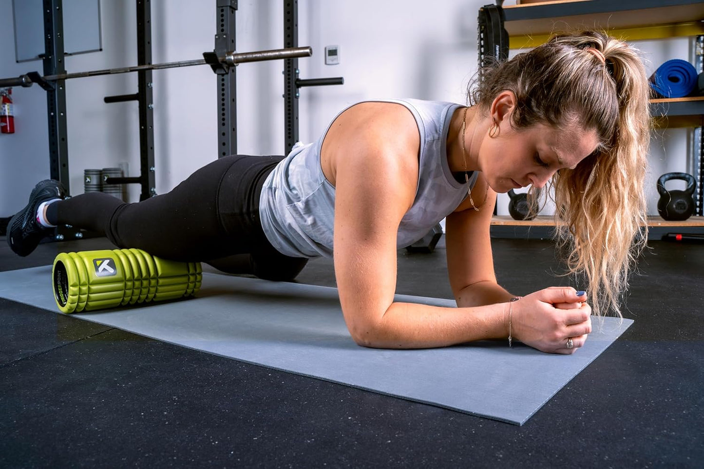 TriggerPoint Grid Foam Roller - Multiple Density Exterior, Rigid Core - Appreciated by Therapists and Athletes - Standard Density, Includes Online Instruction Video, 13"