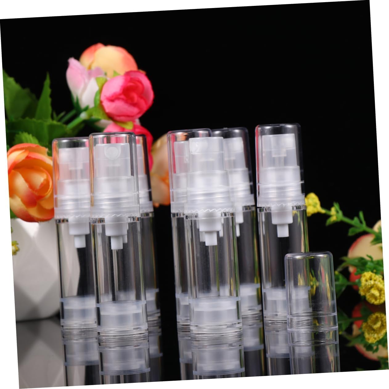 DECORNIJIA 12Pcs Refillable Spray Bottle Press Pump Bottle Transparent Travel Containers for Sunscreen Essential Oils Cleaning Products and Aromatherapy
