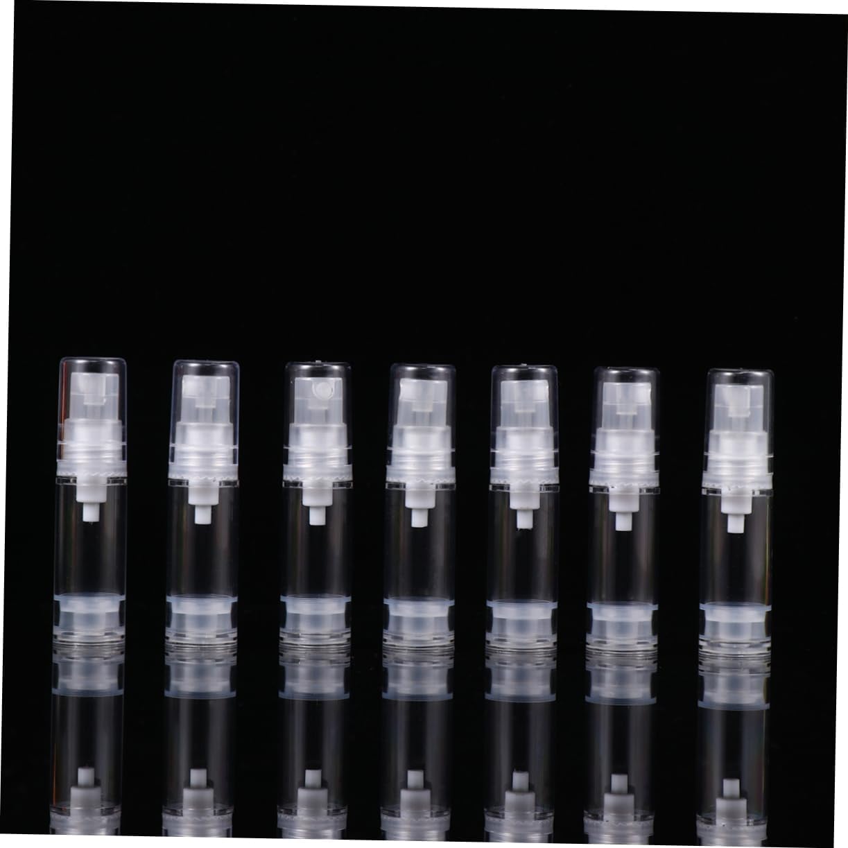 DECORNIJIA 12Pcs Refillable Spray Bottle Press Pump Bottle Transparent Travel Containers for Sunscreen Essential Oils Cleaning Products and Aromatherapy