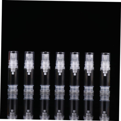 DECORNIJIA 12Pcs Refillable Spray Bottle Press Pump Bottle Transparent Travel Containers for Sunscreen Essential Oils Cleaning Products and Aromatherapy