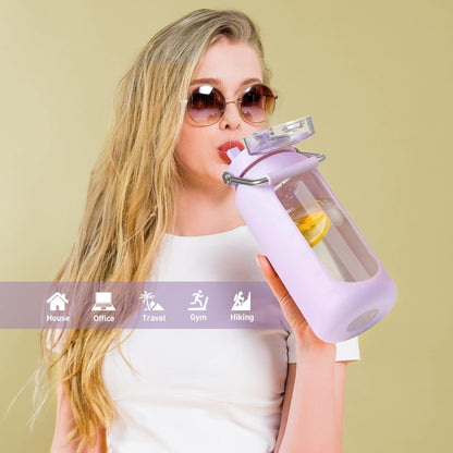 BLUEGO 64oz Purple Glass Water Bottle with Stainless Steel Handle, Time Markers, Silicone Sleeve - BPA Free for Gym, Daily Use, Workout, Travel, Camping, Sports