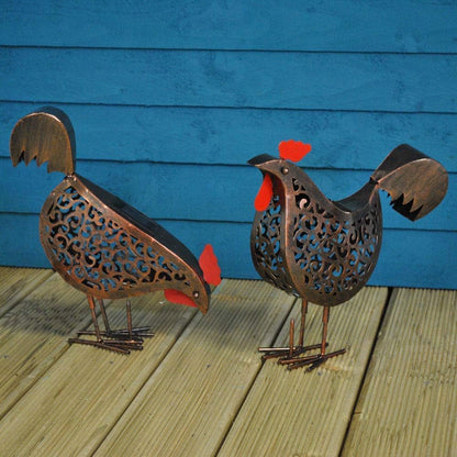 Smart Solar – Set of 2 Metal Solar Lights Ornamental in the Shape of Hens Pitching