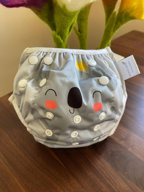 KaWaii Baby Reusable Swim Cloth Diaper Adjustable Swim Pants for Boys & Girls, Size Infants and Toddlers, One Size (Happy Ride Day)