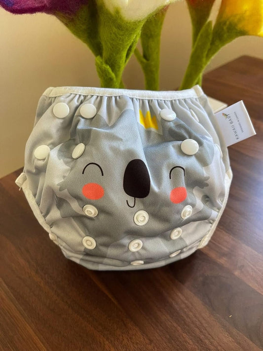 KaWaii Baby Reusable Swim Cloth Diaper Adjustable Swim Pants for Boys & Girls, Size Infants and Toddlers, One Size (Happy Ride Day)