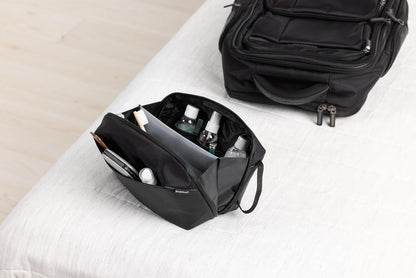 Brookstone Compact Toiletry Kit - Vegan Leather Travel Toiletry Bag with Side Grab Handle - Hygiene Bag Toiletry Organizer, Black, Onesize