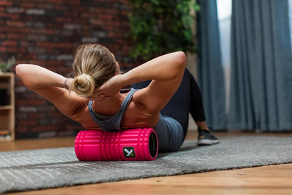 TriggerPoint Grid Foam Roller - Multiple Density Exterior, Rigid Core - Appreciated by Therapists and Athletes - Standard Density, Includes Online Instruction Video, 13"