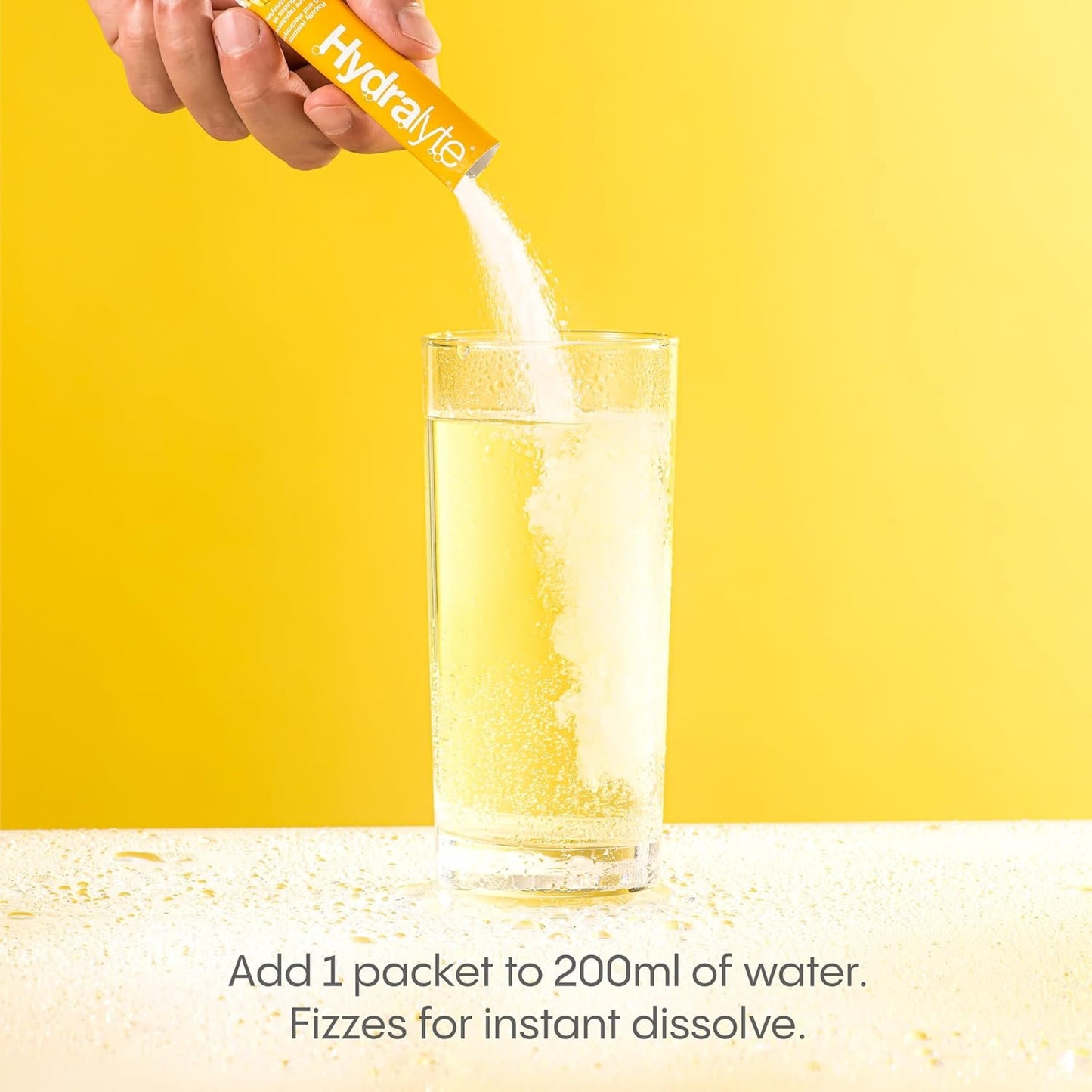 HydraLyte Electrolyte Powder, Low Sugar Electrolyte Sticks Designed for Rapid Hydration, Safe Hydration for All Ages - Made with All Natural Ingredients, 12 Servings, Tropical Flavour
