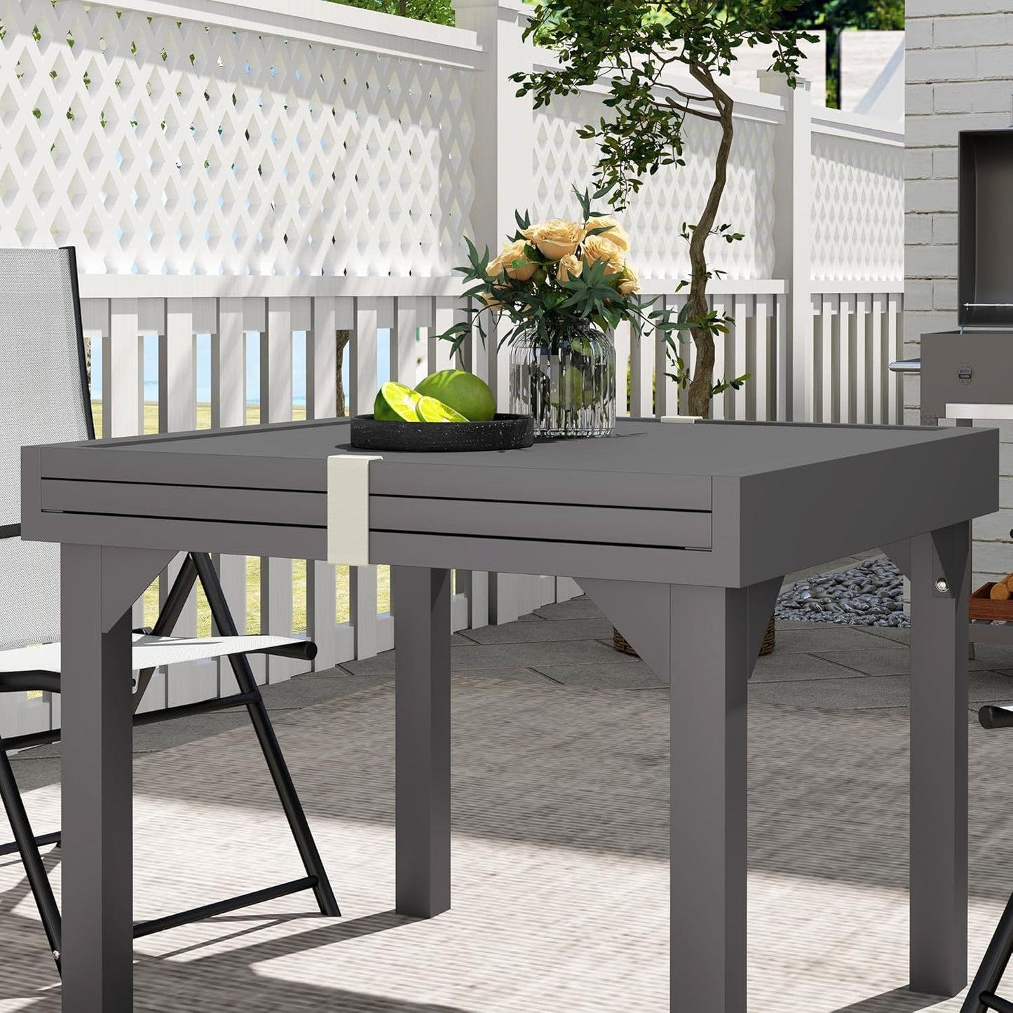 Outsunny Extendable Aluminium Outdoor Dining Table for 4-6 Person, 35"-71" Slatted Metal Patio Table for Garden, Backyard, Deck, Porch, Lawn, Grey