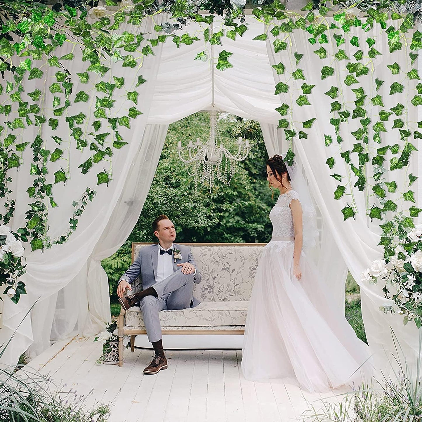 Uandhome 84 Feet 12 Strands Artificial Ivy Leaf Plants Vines Hanging Garland Fake Greenery Vines Foliage Flowers Home Kitchen Garden Office Wedding Wall Decor