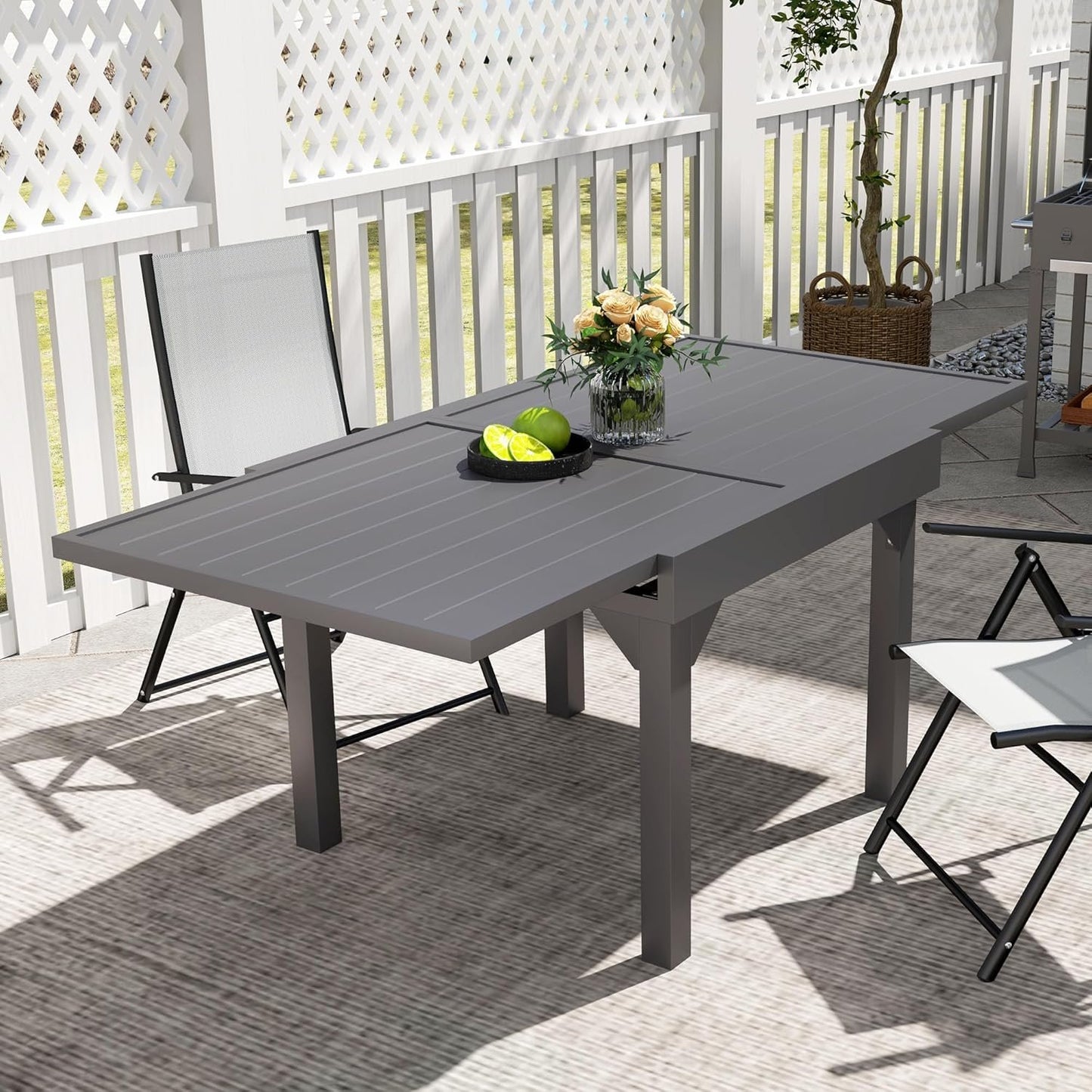Outsunny Extendable Aluminium Outdoor Dining Table for 4-6 Person, 35"-71" Slatted Metal Patio Table for Garden, Backyard, Deck, Porch, Lawn, Grey