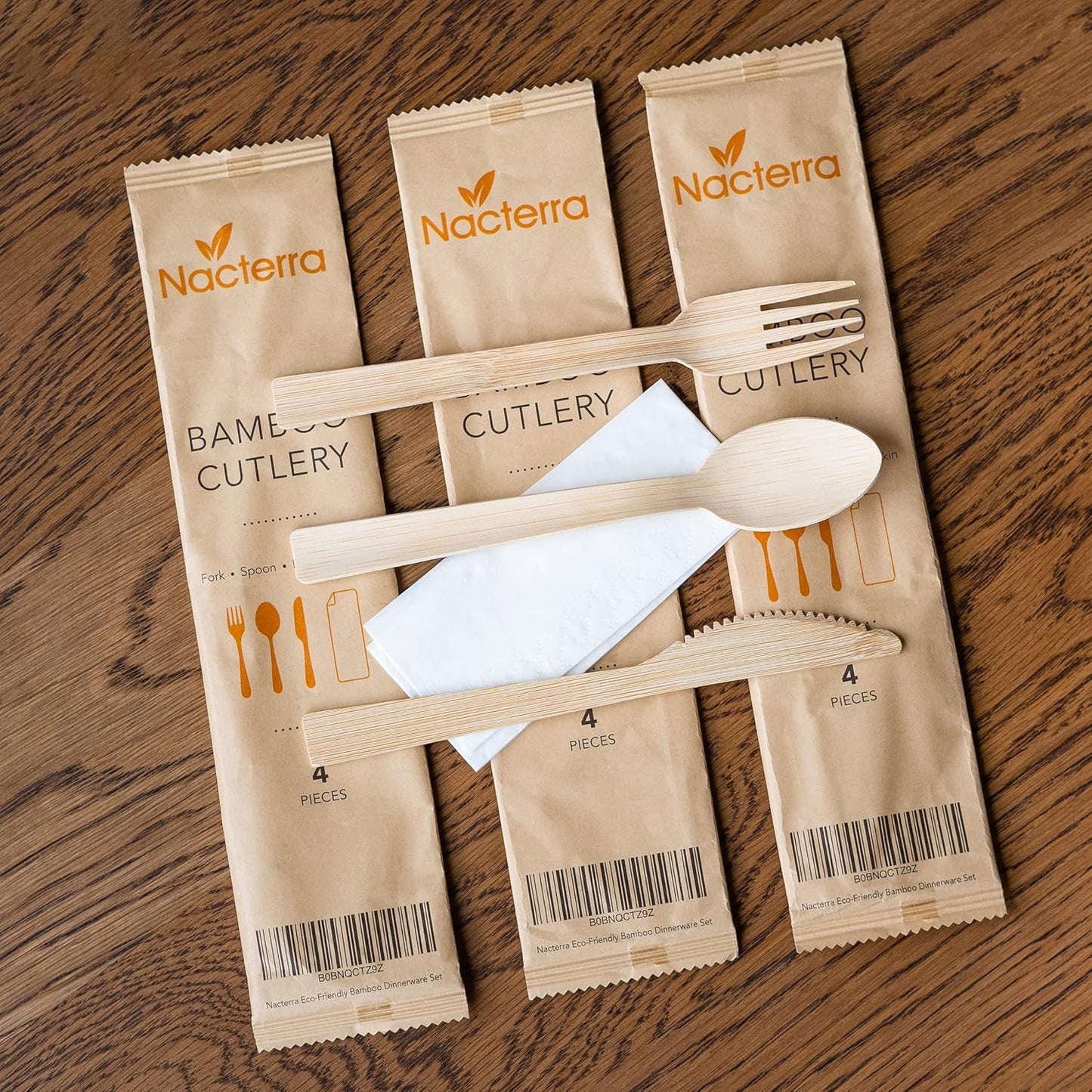 Nacterra Eco-Friendly Disposable Cutlery Set - Biodegradable Wooden Spoons, Forks, and Knives with 1 Napkin - 50 Packs - All Natural Bamboo Dinnerware Set