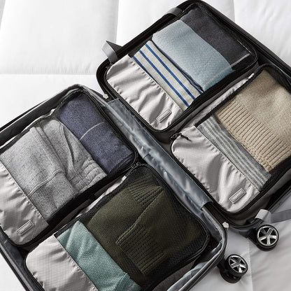 Amazon Basics Medium Packing Cubes for Travel, Packing Organizers, 4-Piece-Set With Double Zipper Pulls and Mesh Top Panel, 100% Durable Polyester, Gray, 35 x 25 x 8cm